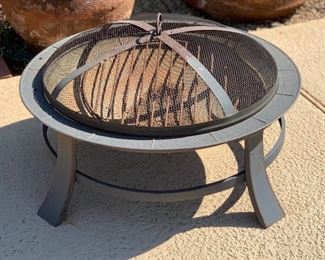 Metal Fire Pit 18in H X 29in diameter HxWxD