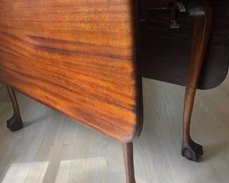 drop leaf table. approx 19 1/2" deep dropped, 58" full. 30" tall and 44" wide. 