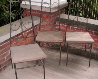 Wrought iron chairs w/ wood seats