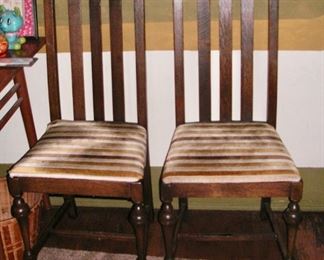 Two matching oak chairs