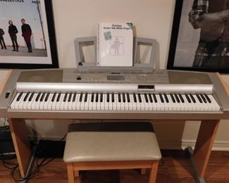 Yamaha portable grand piano and stool