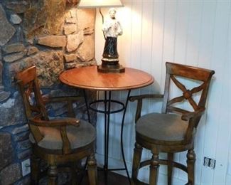 Bar table and swivel stools