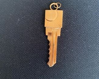 14 Karat gold key