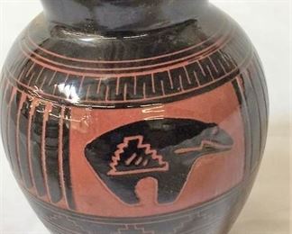https://connect.invaluable.com/randr/auction-lot/navajo-pottery-dine-e-h-native-american-indian_7F44E01BF1
