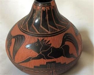 https://connect.invaluable.com/randr/auction-lot/native-american-pottery-signed-js-w-arrow_B944B038C4