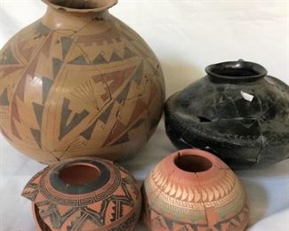 https://connect.invaluable.com/randr/auction-lot/pottery-pieces-repaired-native-american-pottery_422401BB61