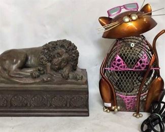 https://connect.invaluable.com/randr/auction-lot/electric-cat-fan-large-lion-paper-holder_D014E028C0