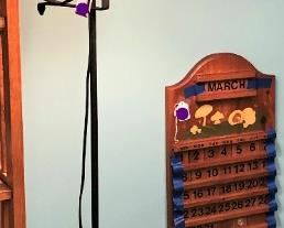 Iron Floor Lamp and Wooden Calendar