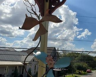 WHIMSICAL IRON FLOWER SCULPTURES