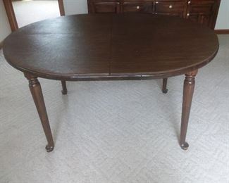 Ethan Allen Dining  Table, 42 x 54 w/ 12-inch leaf &
Table Pad

