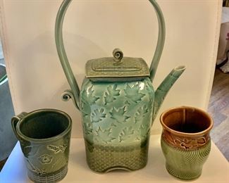 Hand made "Natural Elements" Pottery tea pot and various  hand made "Natural Elements" mugs.  Tea pot ($120) 8" W, 4 " D, 13" H.  Mugs each ($10) 3.25" diam, 4.5" H.