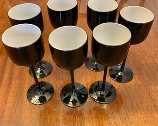 $60 for set of 7 black stemmed wine glasses with white interior.  3.25" diam, 9" H.
