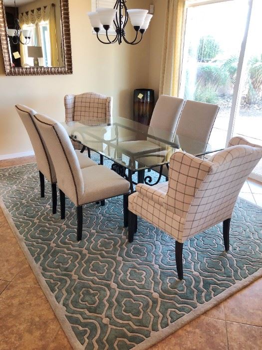 Gorgeous designer glass-top dining set with 6 chairs and beautiful luxury area rug