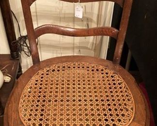Antique chair with cane seat