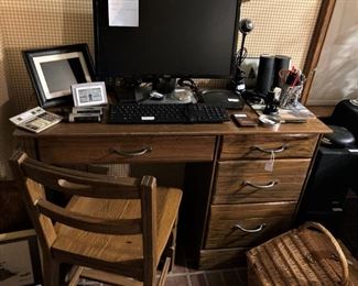 4-drawer desk; computer and keyboard