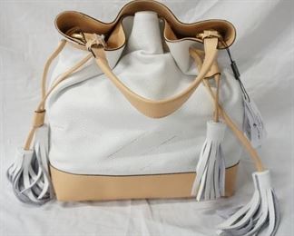 1072 ALBERTA DI CANIO ITALY ELBA LEATHER BUCKET BAG, NEW WITH TAGS , MARKINGS TO THE LEATHER UNSURE IF IT IS STORAGE WEAR OR INTENDED IN THE DESIGN, 12 IN X 12 IN X 4 1/2 IN