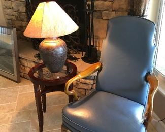 leather armchair - copper hammered lamp