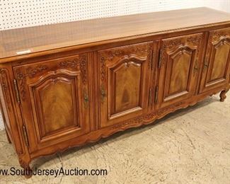 Lot: 503 - John Widdicomb VERY CLEAN 4 door fitted country
John Widdicomb VERY CLEAN 4 door fitted country French carved buffet in the walnut and mahogany