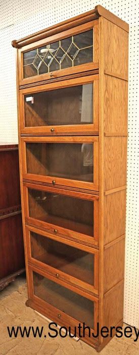 Lot: 512 - Antique style oak faux 6 stack leaded glass
Antique style oak faux 6 stack leaded glass bookcase