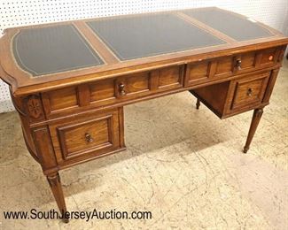 Lot: 516 - VINTAGE walnut leather top desk in the manner of
VINTAGE walnut leather top desk in the manner of Baker Furniture