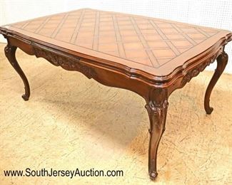 Lot: 527 - BEAUTIFUL country French carved parquet top dining
BEAUTIFUL country French carved parquet top dining room table with refectory leaves in the mahogany and oak