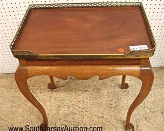 Lot 541
Custom made SOLID mahogany queen anne brass gallery lamp table signed Doug Case and dated 1978