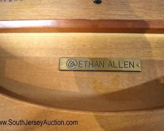 Lot 544
Ethan Allen Furniture burl mahogany and walnut round pedestal center table