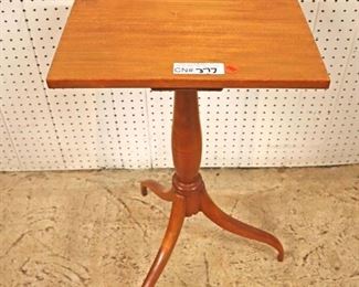 Lot 545
SOLID maple spider leg candle stand