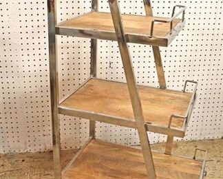 Lot 549
Modern design industrial style 3 tier rolling liquor cart