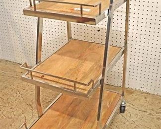 Lot 549
Modern design industrial style 3 tier rolling liquor cart