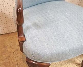 Lot 550
PAIR of SOLID mahogany scroll arm shell carved queen anne upholstered chairs