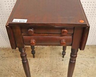 Lot 551
ANTIQUE 2 drawer mahogany drop side work table