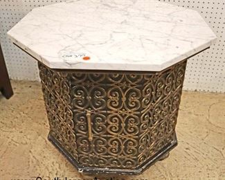 Lot 560
VINTAGE brass octagon marble top mid century table