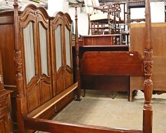 Lot 564
Traditional mahogany banded four poster carved queen size bed with rails