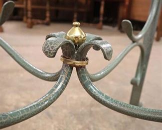 Lot 566
Decorator iron base 54" glass top breakfast table