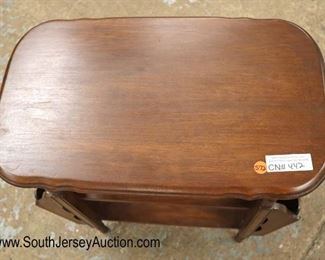 Lot 572
VINTAGE mahogany double magazine rack stand
