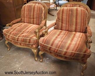 Lot 574
PAIR of oversized country French decorator upholstered arm chairs with down cushions