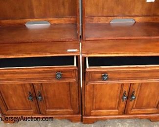 Lot 576
PAIR of 2 piece office credenza bookcases in the cherry finish