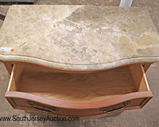 Lot 579
QUALITY Bernhardt Furniture marble top 3 drawer bachelor chest in the country maple finish