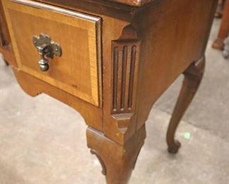 Lot 582
Thomasville Furniture queen anne mahogany banded high boy - missing 1 tear drop pull