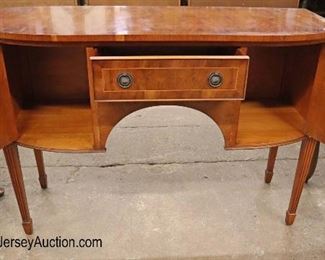 Lot 583
Jay Gee Furniture England yule wood banded 2 door 1 drawer brandy board with key