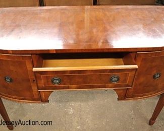 Lot 583
Jay Gee Furniture England yule wood banded 2 door 1 drawer brandy board with key