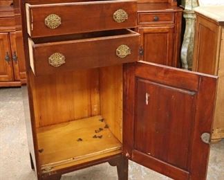 Lot 585
ANTIQUE 2 drawer 1 door silver chest in the mahogany with carved gallery
