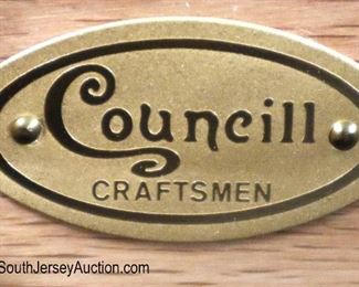Lot 589
Councill Furniture mahogany banded and bell flower inlaid tamper leg sideboard