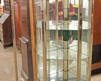 Lot 591
Modern design brass and glass 1 door mirrored back display corner cabinet in the manner of Mastercraft Furniture