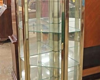 Lot 591
Modern design brass and glass 1 door mirrored back display corner cabinet in the manner of Mastercraft Furniture