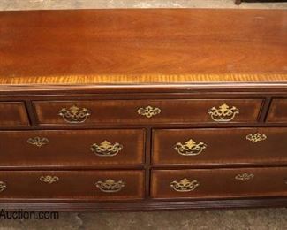 Lot 595
NICE Drexel Furniture 7 drawer bracket foot mahogany banded low chest