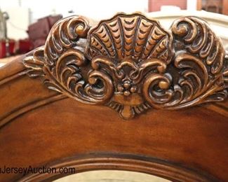 Lot 597A
Contemporary mahogany frame carved beveled mirror