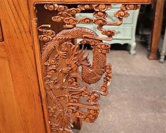 Lot 599
Asian 2 drawer 2 door dragon carved altar console - one fretwork has been repaired