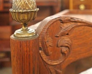 Lot 600
ANTIQUE oak corner cabinet with brass pineapple finials in the original finish with key